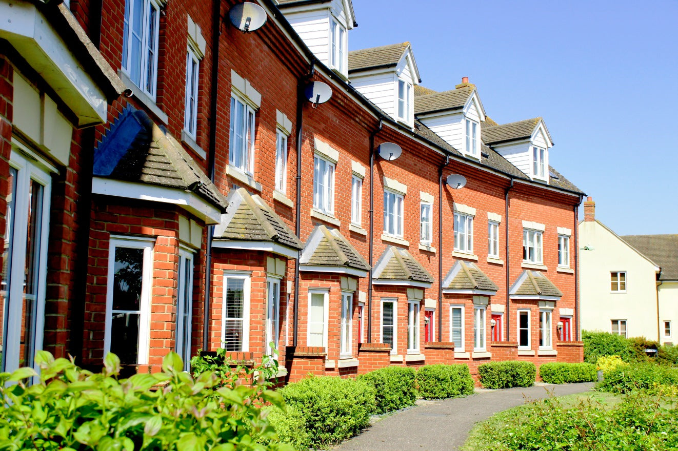 Row of Victorian terraced houses in street of UK