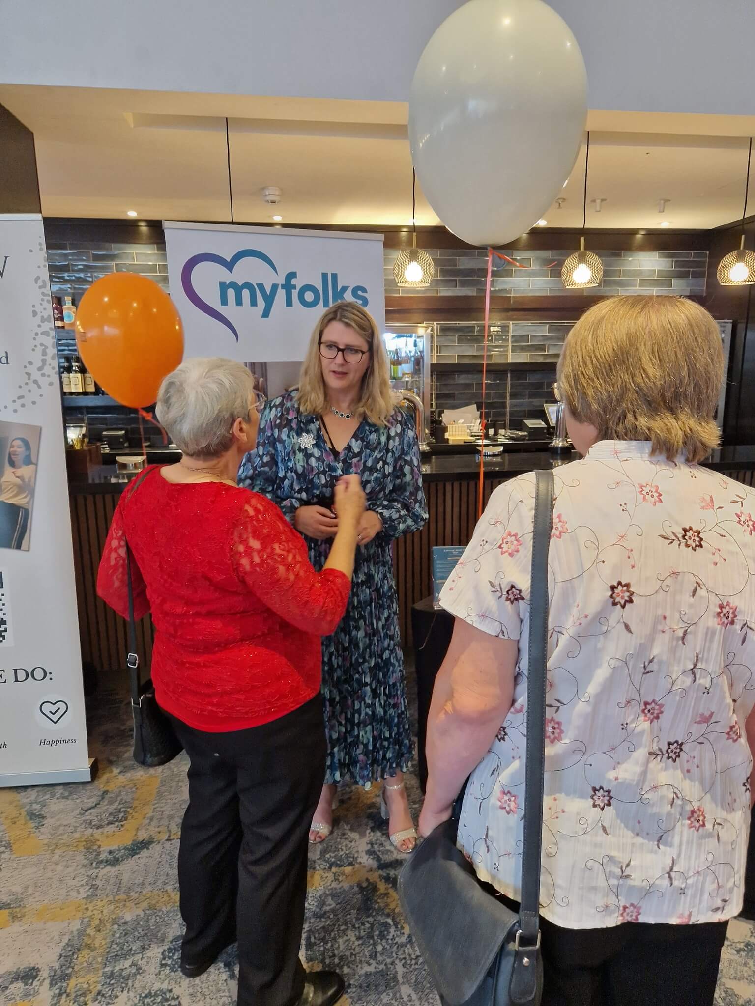 Louise Myfolks speaking to delegates