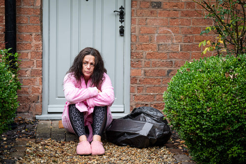 Woman locked out while taking out the bins