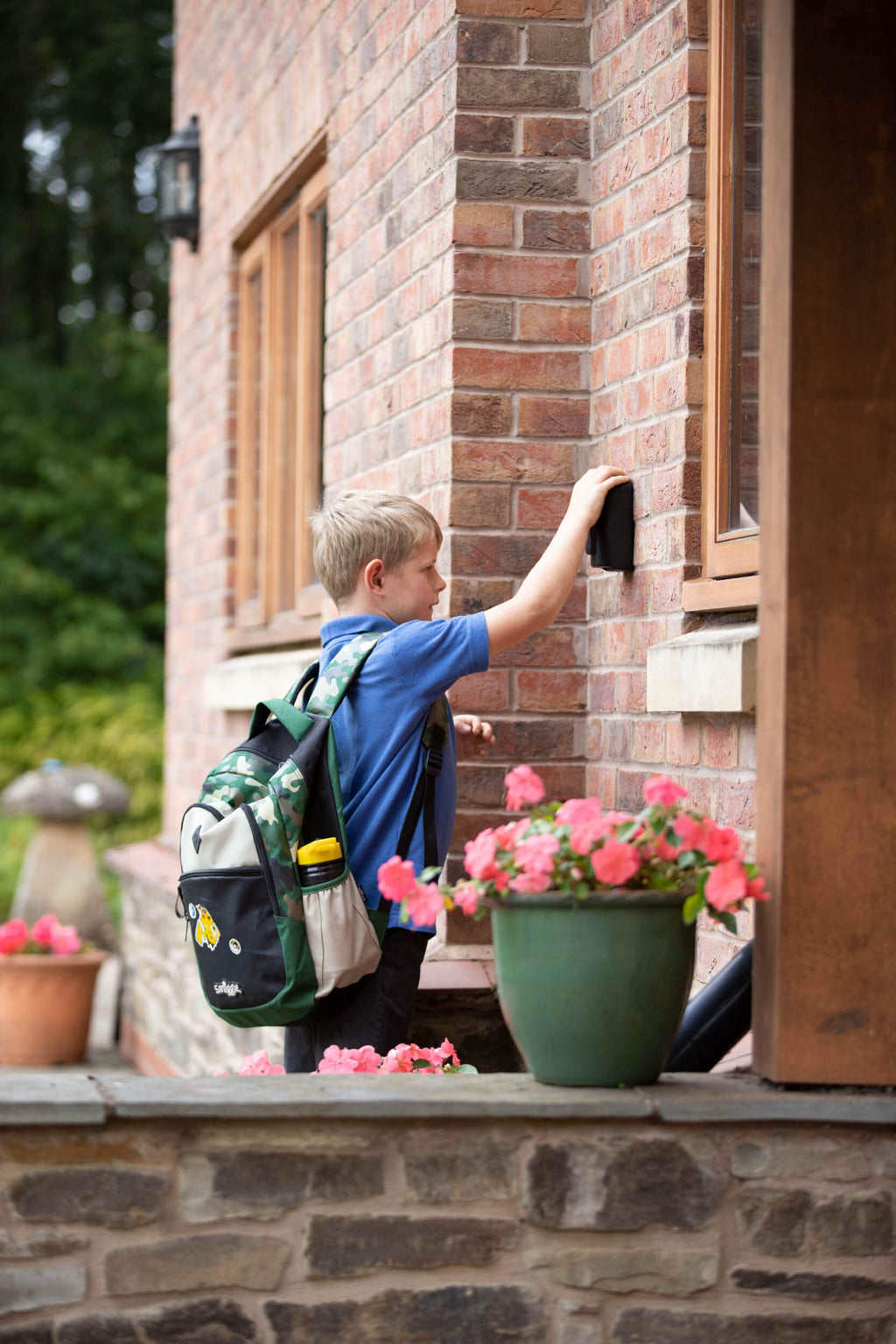 Student Child after school using key safe to enter home, Key Safe Company