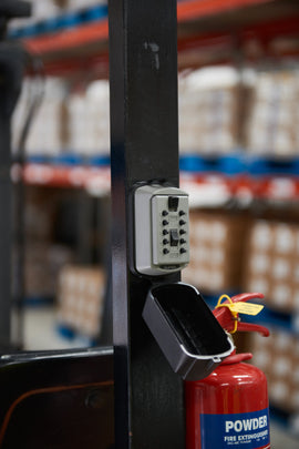 Supra plant and machinery slimline key safe attached to forklift in warehouse