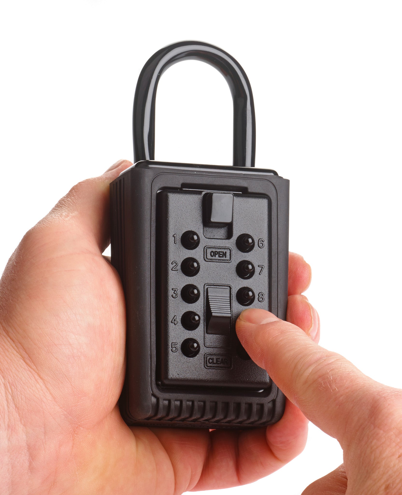 Sleek Supra portable key safe being opened in hand 